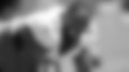 FILE- Denver Broncos defensive end Shelby Harris jokes with teammates as they take part in drills during NFL football training practice at the team's headquarters on Aug. 25, 2021, in Englewood, Colo. For both Shelby Harris and Noah Fant, their unexpected offseason move joining the Seattle Seahawks feels a bit like an eventuality finally coming true.  (AP Photo/David Zalubowski, File)