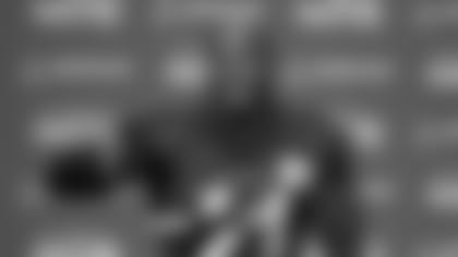 Adrian Peterson, who was signed to the Seattle Seahawks practice squad on Wednesday, talks to reporters Thursday, Dec. 2, 2021, before NFL football practice in Renton, Wash. (AP Photo/Ted S. Warren)