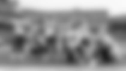 Seahawks defensive players pose for a photo after a fumble recovery by Quandre Diggs in the fourth quarter.