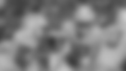 Los Angeles Chargers quarterback Justin Herbert (10) drops back with the ball, with running back Austin Ekeler (30) during an NFL football game against the Kansas City Chiefs Thursday, Sep. 15, 2022, in Kansas City, Mo. (AP Photo/Peter Aiken)