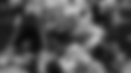 Seattle's Bobby Wagner and Bradley McDougald hit Carolina's Christian McCaffrey during the third quarter.