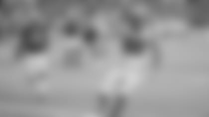 Carolina Panthers tight end Greg Olsen (88) scores a touchdown as Arizona Cardinals outside linebacker Haason Reddick (43) pursues during the second half of an NFL football game, Sunday, Sept. 22, 2019, in Glendale, Ariz. (AP Photo/Ross D. Franklin)