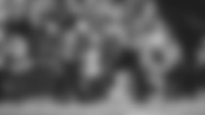 Seahawks running back Chris Carson runs free for a 61-yard gain in the third quarter as 12s get excited.