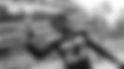 After the game Tariq Woolen records a video to be posted to social media for Seahawks fans.