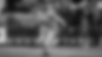 Seattle's George Fant, an offensive lineman who often lines up as an eligible receiver for blocking purposes, heads downfield after catching the first pass of his career.