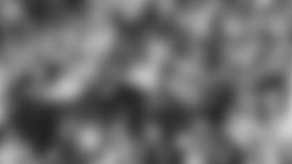 Seahawks linebacker Bobby Wagner leaps to corral airborne Panthers running back Christian McCaffrey in the second quarter.