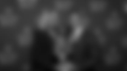 Seattle Seahawks quarterback Russell Wilson and his wife Ciara pose for a photo after Wilson won the Walter Payton NFL Man of the Year awards at the NFL Honors ceremony as part of Super Bowl 55 Friday, Feb. 5, 2021, in Tampa, Fla. (AP Photo/Charlie Riedel)