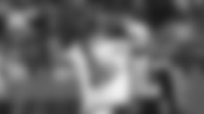 Chicago Bears quarterback Justin Fields passes during the first half of an NFL football game against the Minnesota Vikings Monday, Dec. 20, 2021, in Chicago. (AP Photo/Nam Y. Huh)