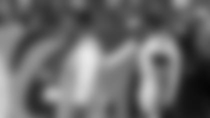 Injured Tennessee Titans quarterback Marcus Mariota stands behind head coach Mike Vrabel in the second half of an NFL football game against the Houston Texans Sunday, Sept. 16, 2018, in Nashville, Tenn. (AP Photo/James Kenney)