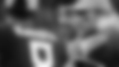 Tennessee Titans head coach Mike Vrabel, center, talks with quarterbacks Marcus Mariota (8) and Blaine Gabbert, right, in the first half of a preseason NFL football game against the Minnesota Vikings Thursday, Aug. 30, 2018, in Nashville, Tenn. (AP Photo/James Kenney)