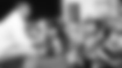 Titans head coach Mike Vrabel reads to students Monday at Paragon Mills Elementary before handing out books from his Second and Seven Foundation as a kickoff to the school’s Read Across America Week.