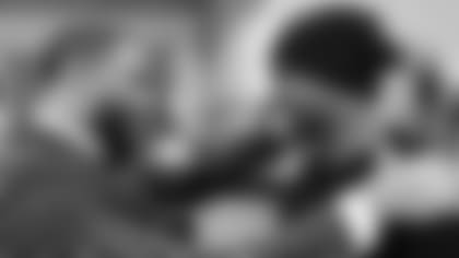 Titans linebacker Wesley Woodyard with Hall of Famer Brian Dawkins, his teammate with the Broncos.