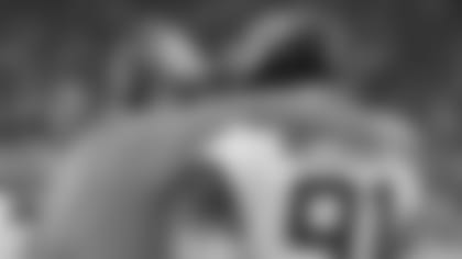 Jacksonville Jaguars defensive coordinator Todd Wash talks with defensive end Yannick Ngakoue (91) against the Houston Texans during an NFL game Sunday, December 30, 2018 in Houston. (Rick Wilson via AP)