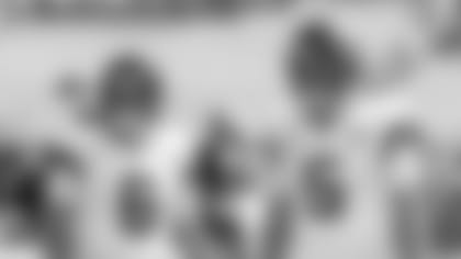 Jacksonville Jaguars quarterbacks Cody Kessler (6) and Blake Bortles (5) talk during warm ups before an NFL football game against the Tennessee Titans, Sunday, Sept. 23, 2018, in Jacksonville, Fla. (AP Photo/John Raoux)