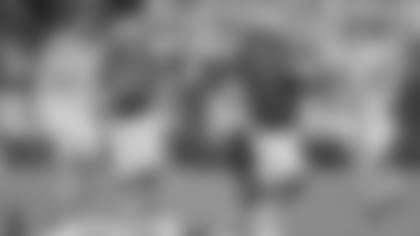 FILE - In this Dec. 29, 2016, file photo, Virginia Tech's Cam Phillips (5) runs past Arkansas's Santos Ramirez (9) during the second half of the Belk Bowl NCAA college football game in Charlotte, N.C. Phillips is one of the players to keep an eye on when ACC schools begin preseason camp over the summer. (AP Photo/Bob Leverone, File)