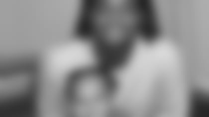 Seahawks running back DeeJay Dallas with his son, also named DeeJay.