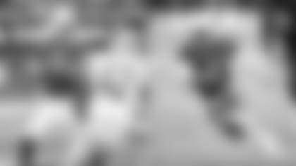 Cardinals quarterback Kyler Murray (left) in his NFL debut against the Lions to open the 2019 season and (right) running upfield last week in a win against Washington.