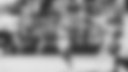 Wide receiver Christian Kirk launches the first pass of his NFL career Sunday, completing it for 33 yards to Antoine Wesley.