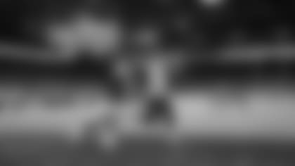 Seattle's Tyler Lockett catches a beautifully thrown pass by Russell Wilson for a 24-yard touchdown in the second quarter.