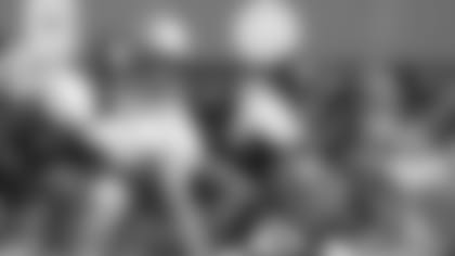 Members of the Reese's Senior Bowl American team line up for a drill during practice.