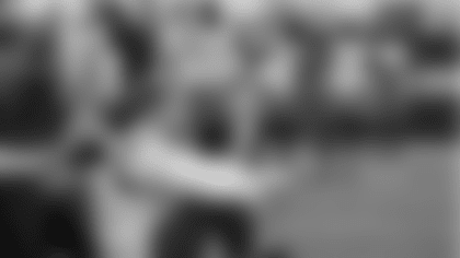 Bengals scout Andrew Johnson in the front row with stopwatch at Penn State pro day.