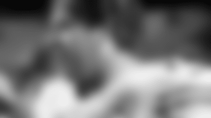 New England Patriots Willie McGinest holds the AFC Championship trophy after the Pats beat the Jacksonville Jaguars 20-6  at Foxboro Stadium in Foxboro, Mass., Sunday January 12, 1997. (AP Photo/Doug Mills)