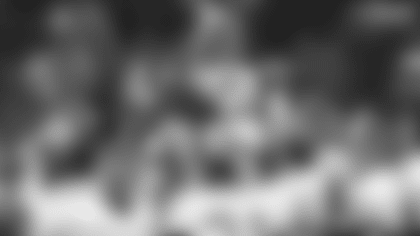 Washington Football Team wide receiver Art Monk is hoisted by his teammates after breaking the record for career receptions in the fourth quarter of their game against the Denver Broncos at RFK Stadium. (Associated Press)