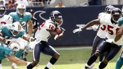 Wide receiver Tony Martin of the Miami Dolphins runs with the ball