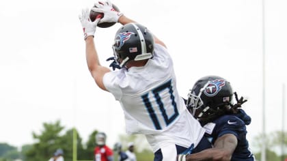 Tennessee Titans wide receiver Tajae Sharpe runs a drill during an  organized team activity at the Titans' NFL football training facility  Wednesday, June 12, 2019, in Nashville, Tenn. (AP Photo/Mark Humphrey Stock