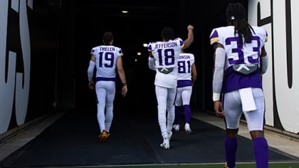 Adam Thielen of the Minnesota Vikings celebrates with Dakota Dozier