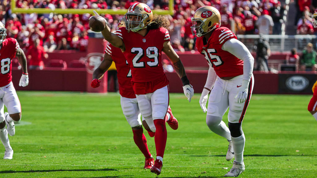 San Francisco 49ers safety Talanoa Hufanga, left, poses for photos