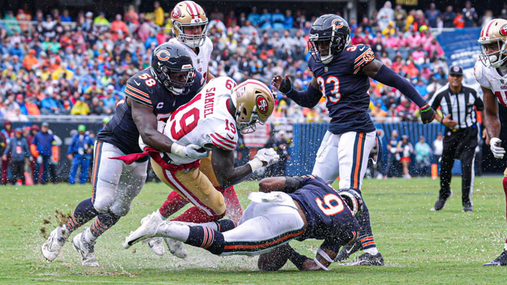 Heavy rain floods Soldier Field during Chicago Bears' season opener against  San Francisco 49ers