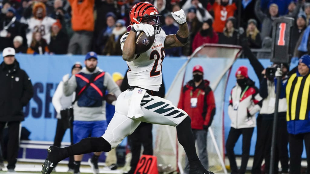 Cincinnati Bengals linebacker Logan Wilson (55) and Cincinnati Bengals  guard Hakeem Adeniji (77) leave the field after an NFL divisional round  playoff football game against the Tennessee Titans, Saturday, Jan. 22, 2022