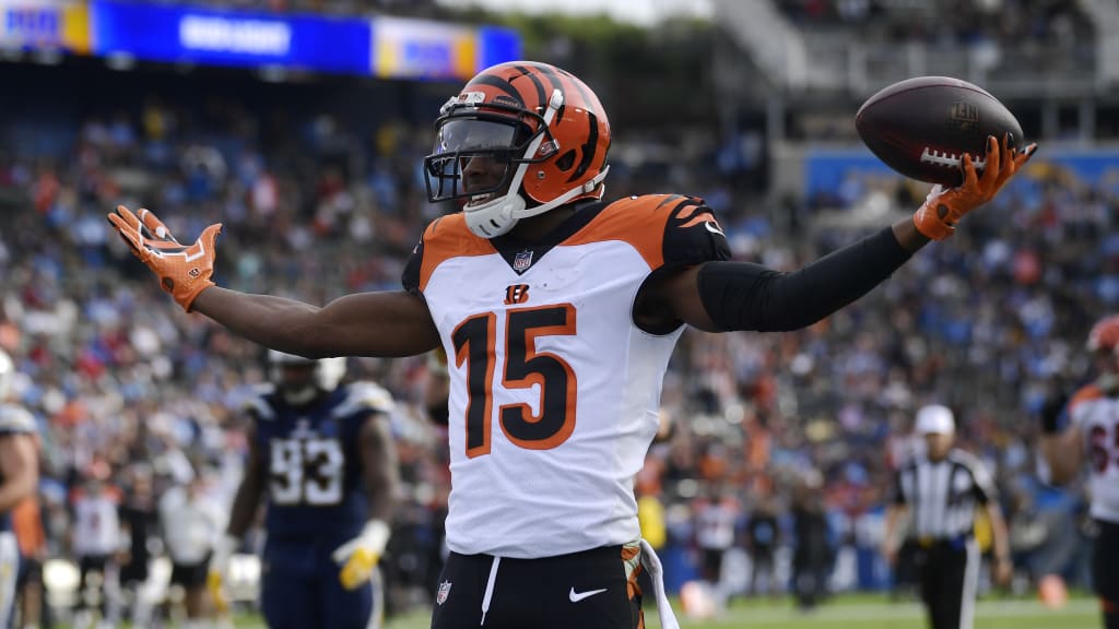 CINCINNATI, OH - DECEMBER 05: Cincinnati Bengals wide receiver Tyler Boyd  (83) carries the ball during the game against the Los Angeles Chargers and  the Cincinnati Bengals on December 5, 2021, at