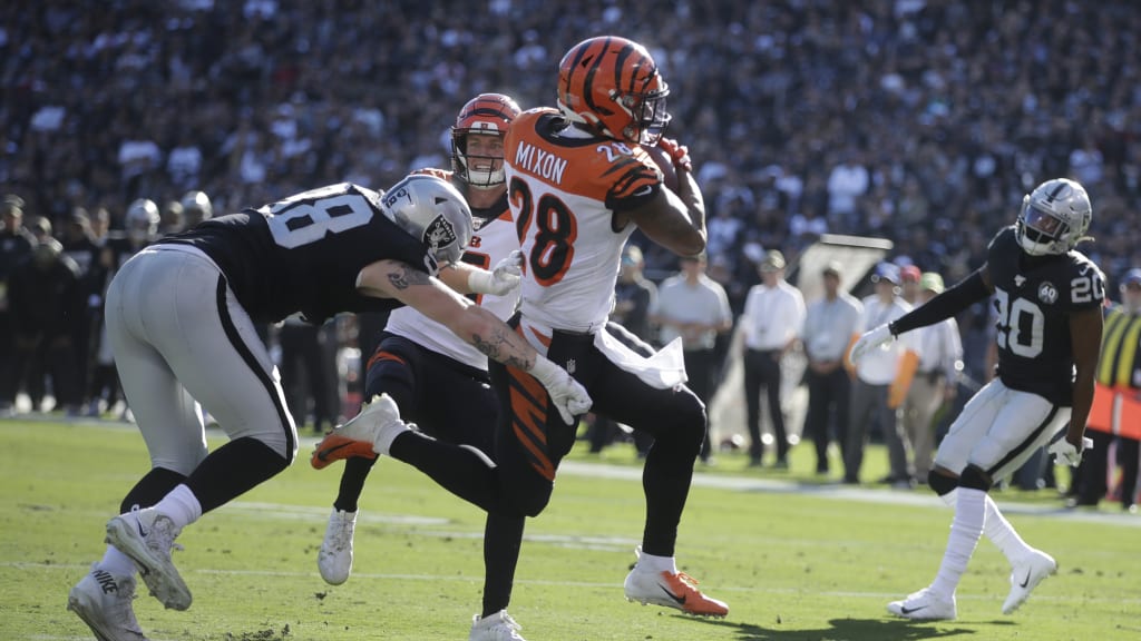 Cincinnati Bengals running back Joe Mixon scores a touchdown during the  first half of an NFL football game against the Oakland Raiders n Oakland,  Calif., Sunday, Nov. 17, 2019. (AP Photo/D. Ross