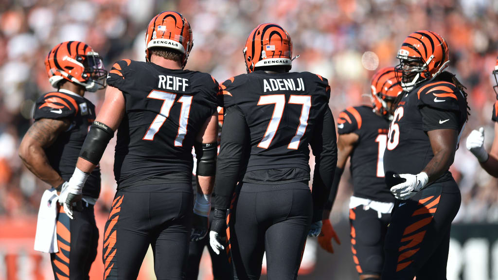 Cincinnati Bengals linebacker Akeem Davis-Gaither (59) carries the ball  after an interception during an NFL wild-card football game against the  Baltimore Ravens on Sunday, Jan. 15, 2023, in Cincinnati. (AP Photo/Emilee  Chinn