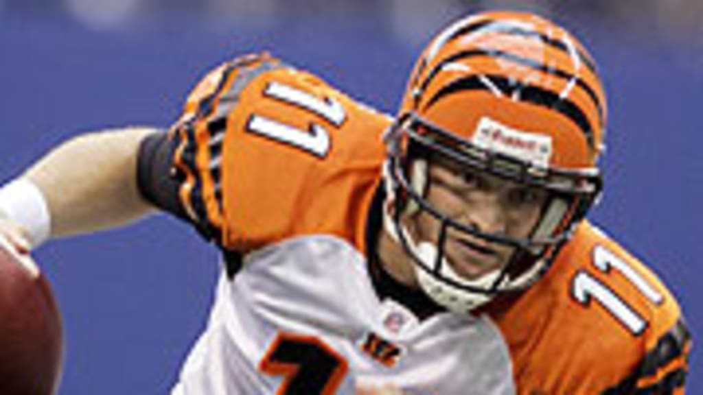 Cincinnati Bengals running back Rudi Johnson points to a group of