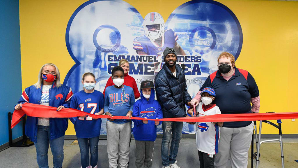 Bills Fans Playing cornhole at the Bills Mafia House show support for Damar  - 2022 Buffalo Bills - Bills Fans