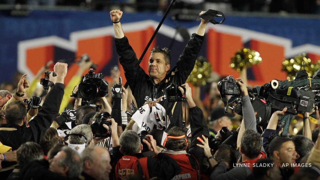 New Orleans Saints quarterback Drew Brees (black shirt) celebrates on the  field with Jonathan Vilma after the Saints beat the Vikings 31-28 to win  the NFC Championship game at the Louisiana Superdome