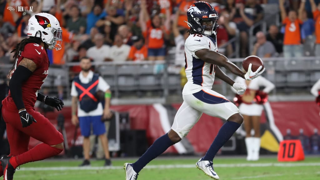 DENVER, CO - DECEMBER 18: The Denver Broncos offense gets ready for a play  during an NFL game between the Arizona Cardinals and the Denver Broncos on December  18, 2022 at Empower