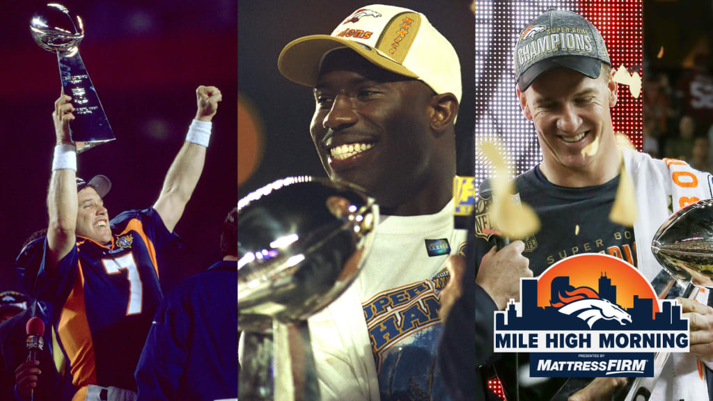 Shannon Sharpe of the Denver Broncos holds the Lombardi Trophy