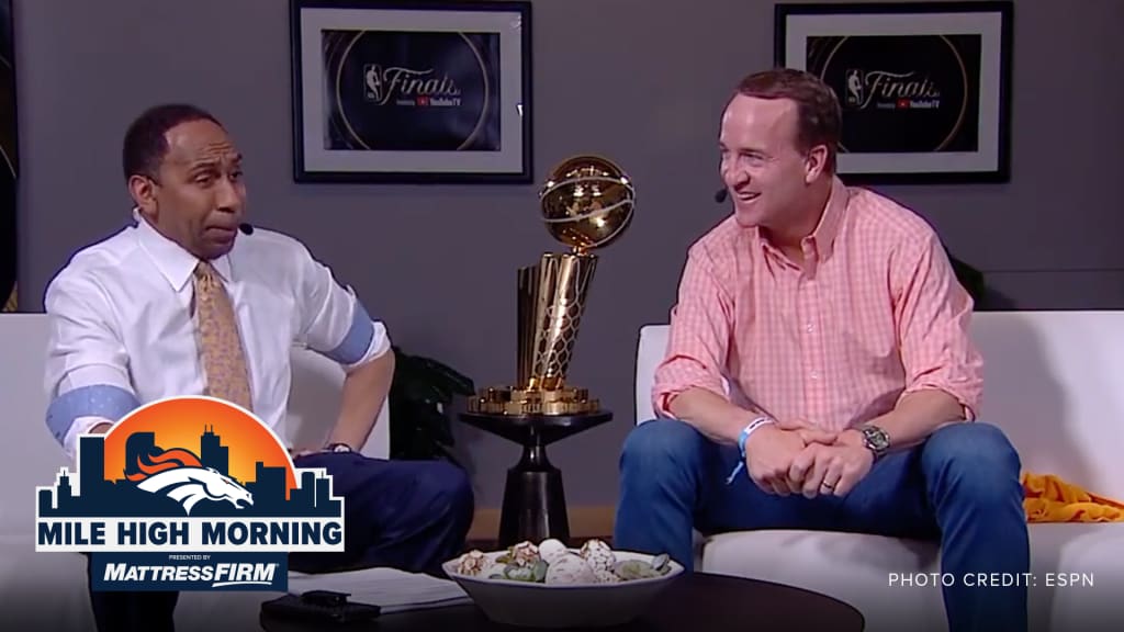 Broncos legend Peyton Manning celebrates Nuggets championship courtside