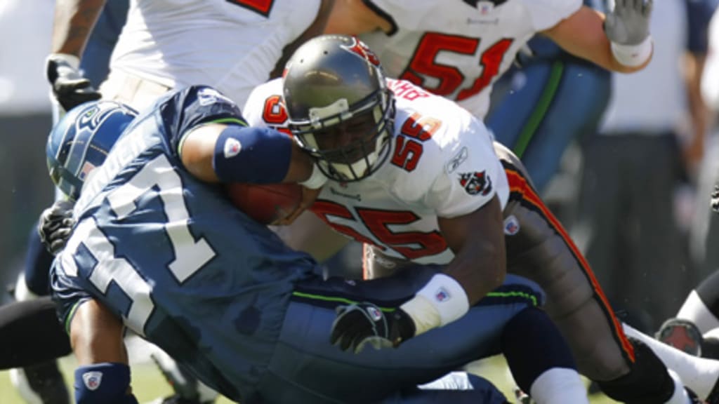 Tampa Bay Buccaneers' wide receiver Micheal Spurlock (17) takes a kick-off  return for a 90-yard touchdown putting his name in the record books as  scoring the first kick-off-return touchdown in the Buccaneers'