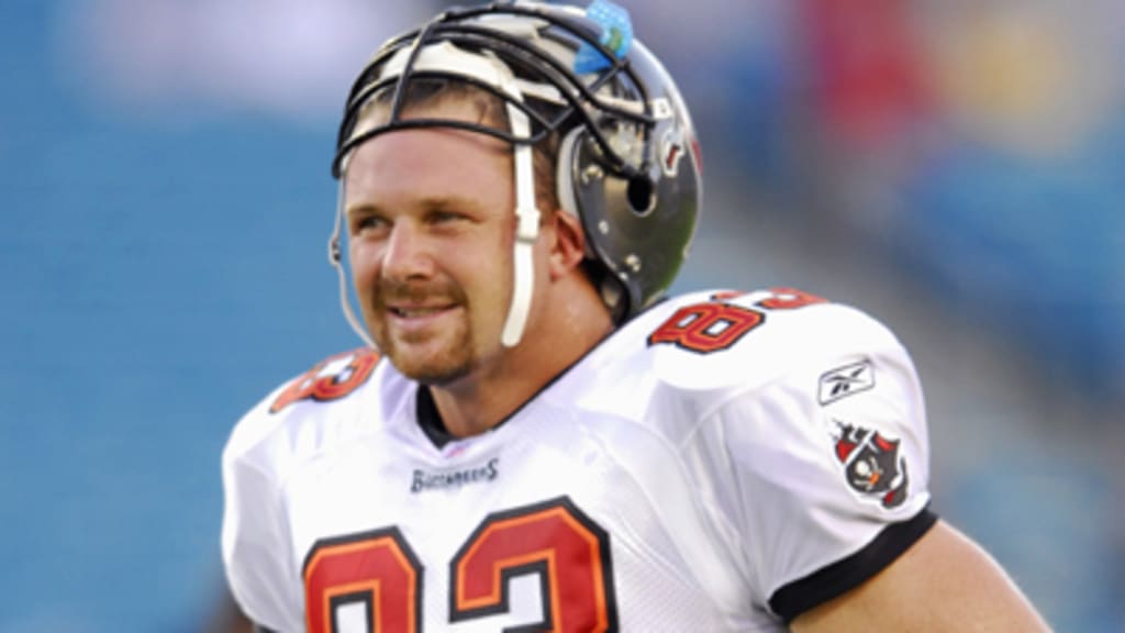 Tampa Bay Buccaneers' tight end Dave Moore looks at ba replay between plays  during a game against the New York Jets at Raymond James Stadium in Tampa,  Florida on August 11, 2006.