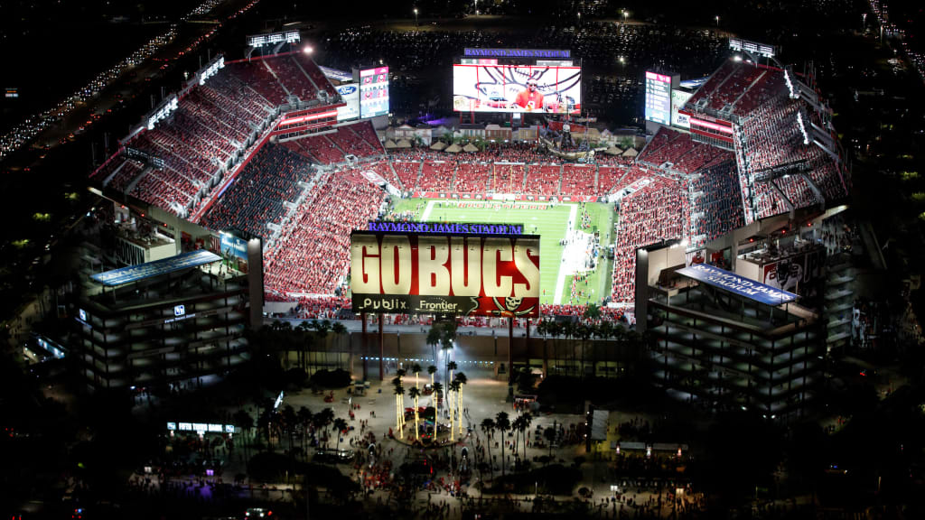 Bucs fans return to Raymond James Stadium for draft party, expect a wait