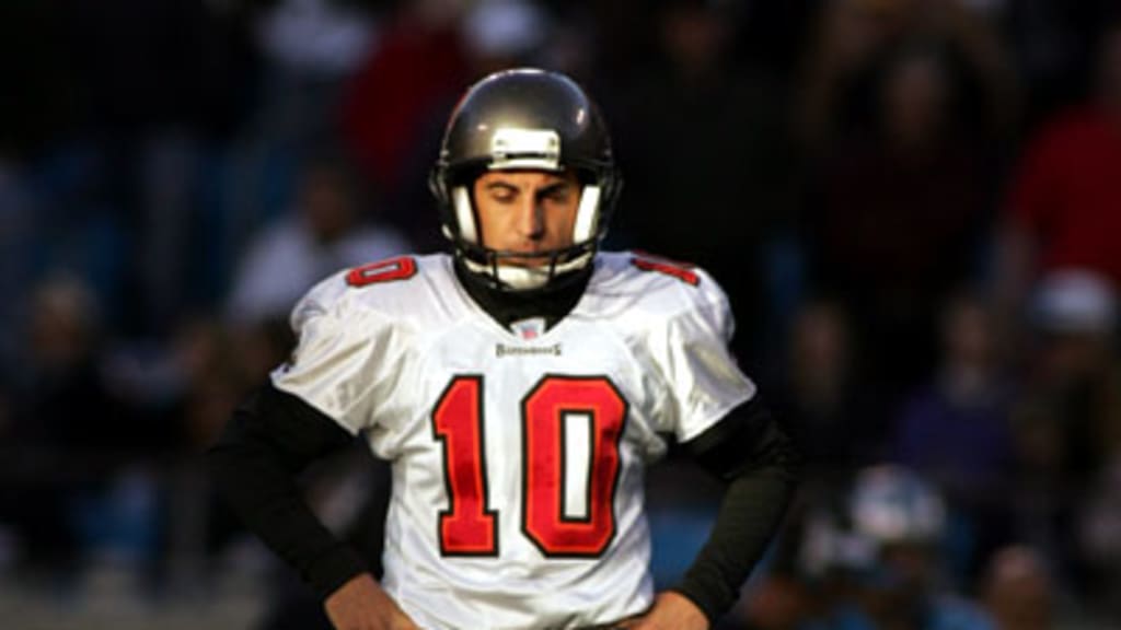 Tampa Bay Buccaneers' Jay Taylor (6) watches a replay as he played in his  first NFL game replacing Martin Gramatica, the franchise's all-time leading  scorer. Taylor made good in his first-game opportunity putting nine of the  Bucs' 27 points on the boar