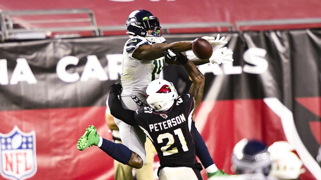 Minnesota Vikings cornerback Patrick Peterson (7) runs with the ball after  intercepting a pass during the first half of an NFL football game against  the Chicago Bears, Sunday, Jan. 8, 2023, in