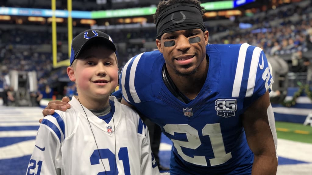 Custom Cleats Connect Nyheim Hines With Young Fan With Muscular