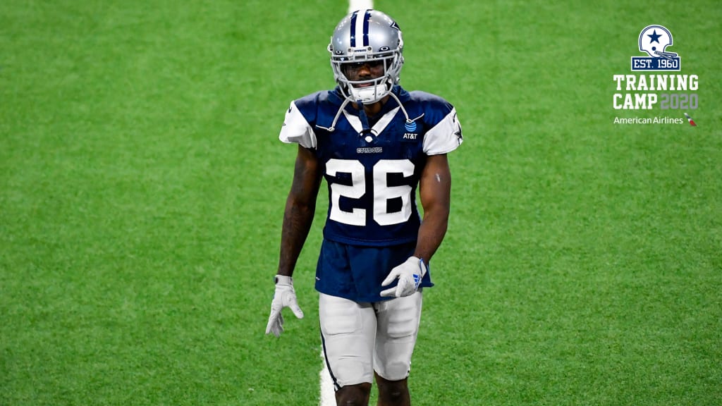 Dallas Cowboys helmets sit on the field during an NFL training camp football  practice in Frisco …