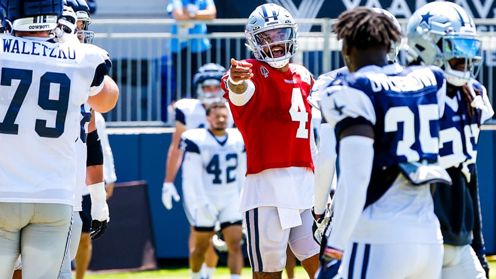 Cowboys training camp photos: Quarterback Dak Prescott rolls out to throw a  dime